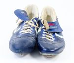 Dennis Leonard Game Used Glove & Cleats